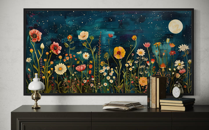 Large horizontal wall art of a wildflower field at night under a full moon and starry sky.