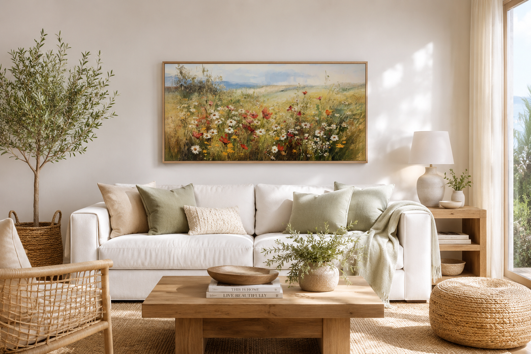 Panoramic farmhouse canvas wall art featuring a vibrant wildflower field above a white sofa.