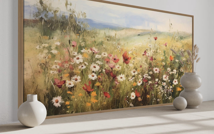 Panoramic farmhouse canvas wall art featuring a vibrant field of wildflowers in a wooden frame.