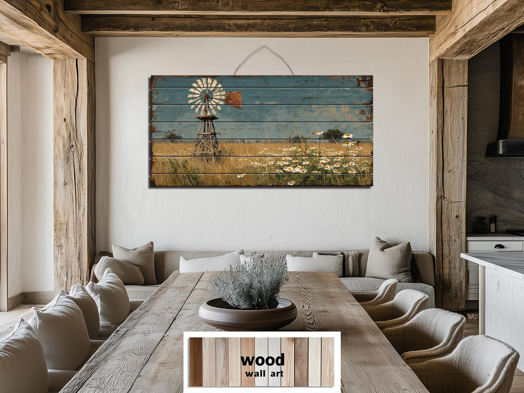 A horizontal wood wall art piece featuring a distressed windmill and wildflower field landscape.