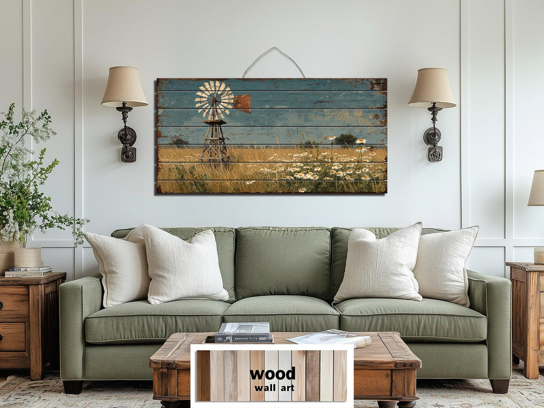 A horizontal wood wall art piece featuring a windmill and wildflowers in a rustic farmhouse style.