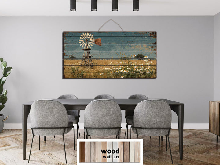 Windmill and wildflowers distressed wood wall art hanging in a modern farmhouse dining room.