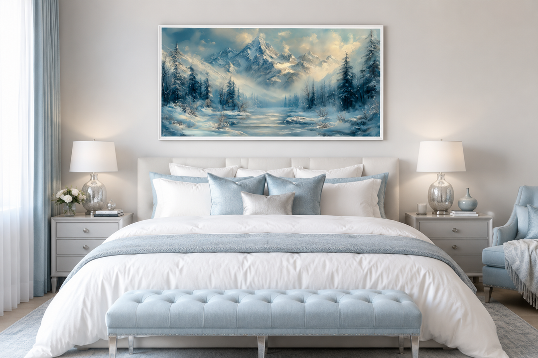 Winter Mountain wall art featuring a snowy alpine landscape above a bed in a blue and white bedroom.
