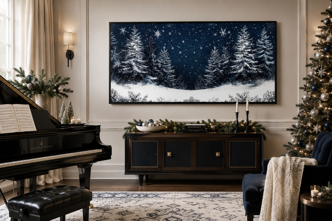 Framed canvas wall art of snow-covered pine trees in a forest at night above a dark wood sideboard.