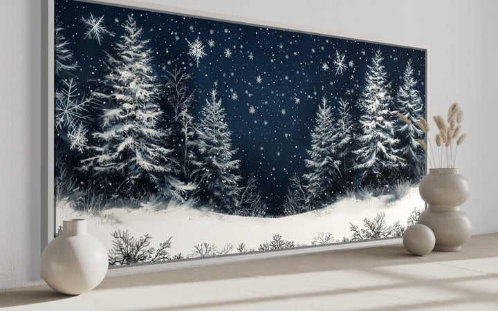 Winter wonderland pine trees forest framed canvas wall art with snow and a midnight blue sky.