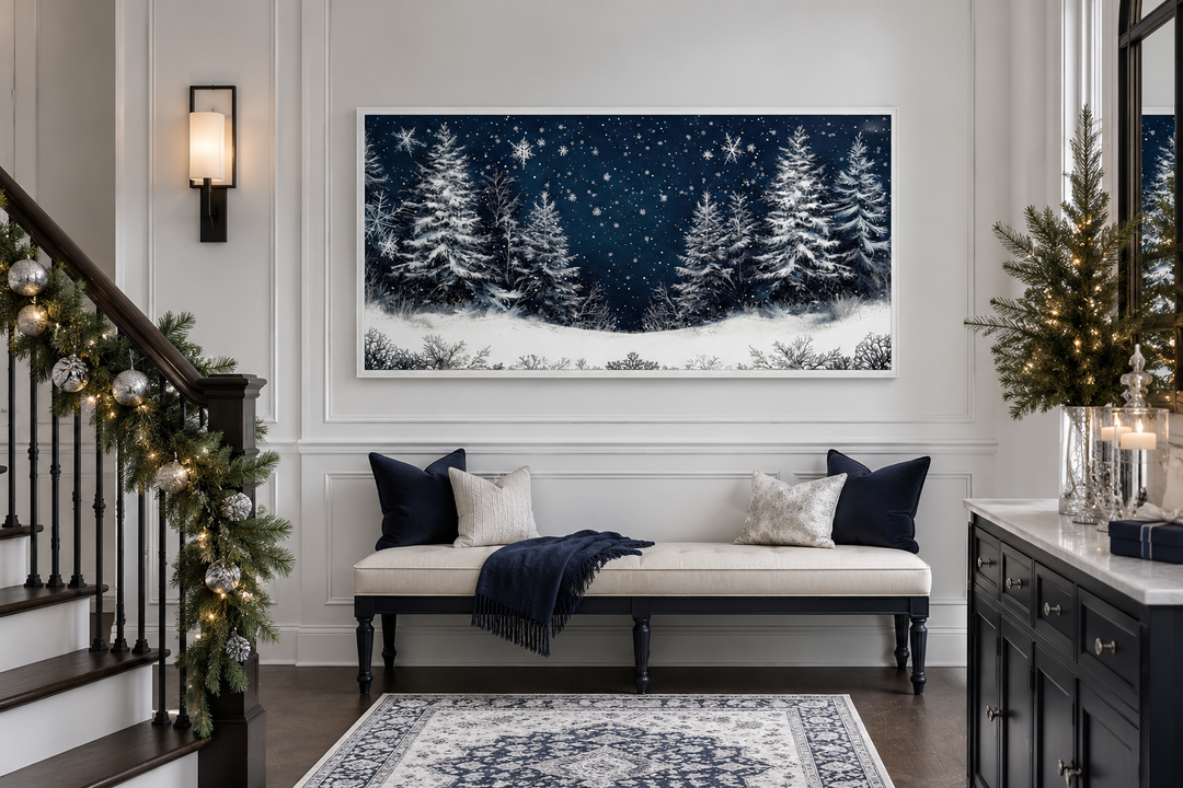Winter wonderland pine trees forest framed canvas wall art above a bench in a holiday entryway.
