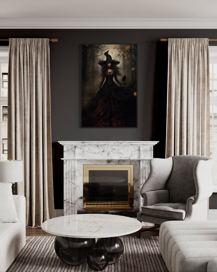 Gothic framed canvas wall art of a witch and her raven in an enchanted forest above a fireplace.