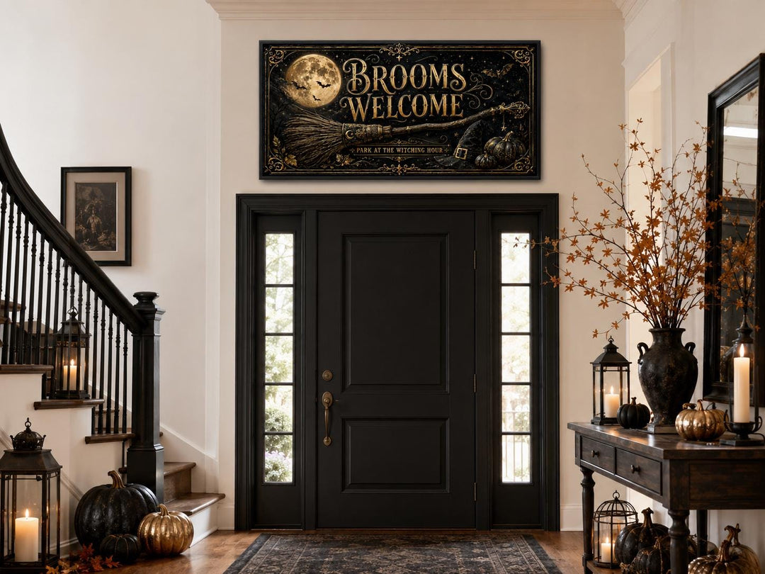 Brooms Welcome sign above a black front door with pumpkins and lanterns in a Halloween entryway.