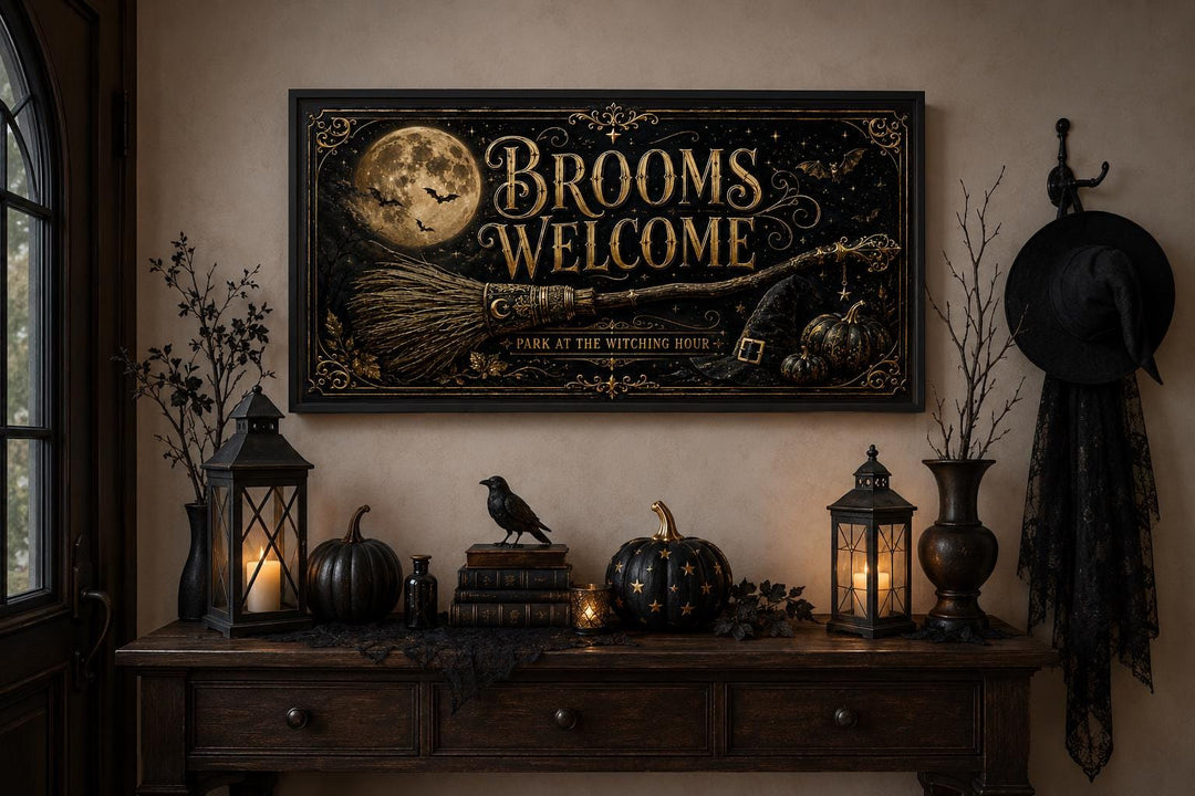 Brooms Welcome Halloween wall art above a console table with pumpkins, lanterns, and a raven.