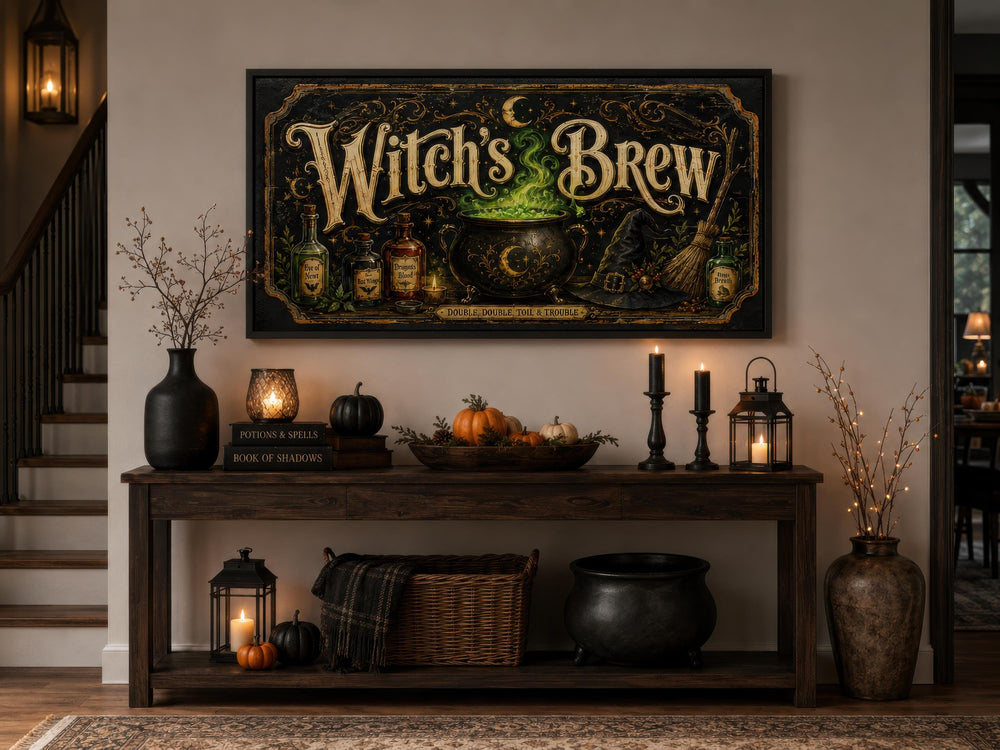 Vintage Witch's Brew canvas wall art with gold script and a glowing green cauldron above a console.