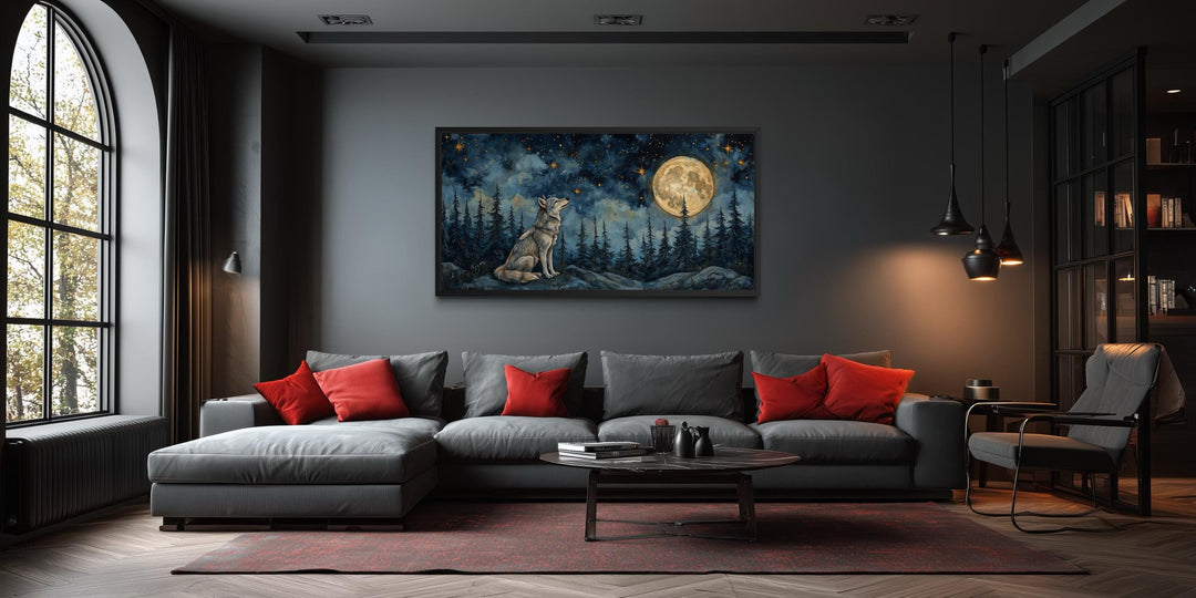 Horizontal canvas wall art of a wolf under a full moon in a forest, displayed in a modern living room.