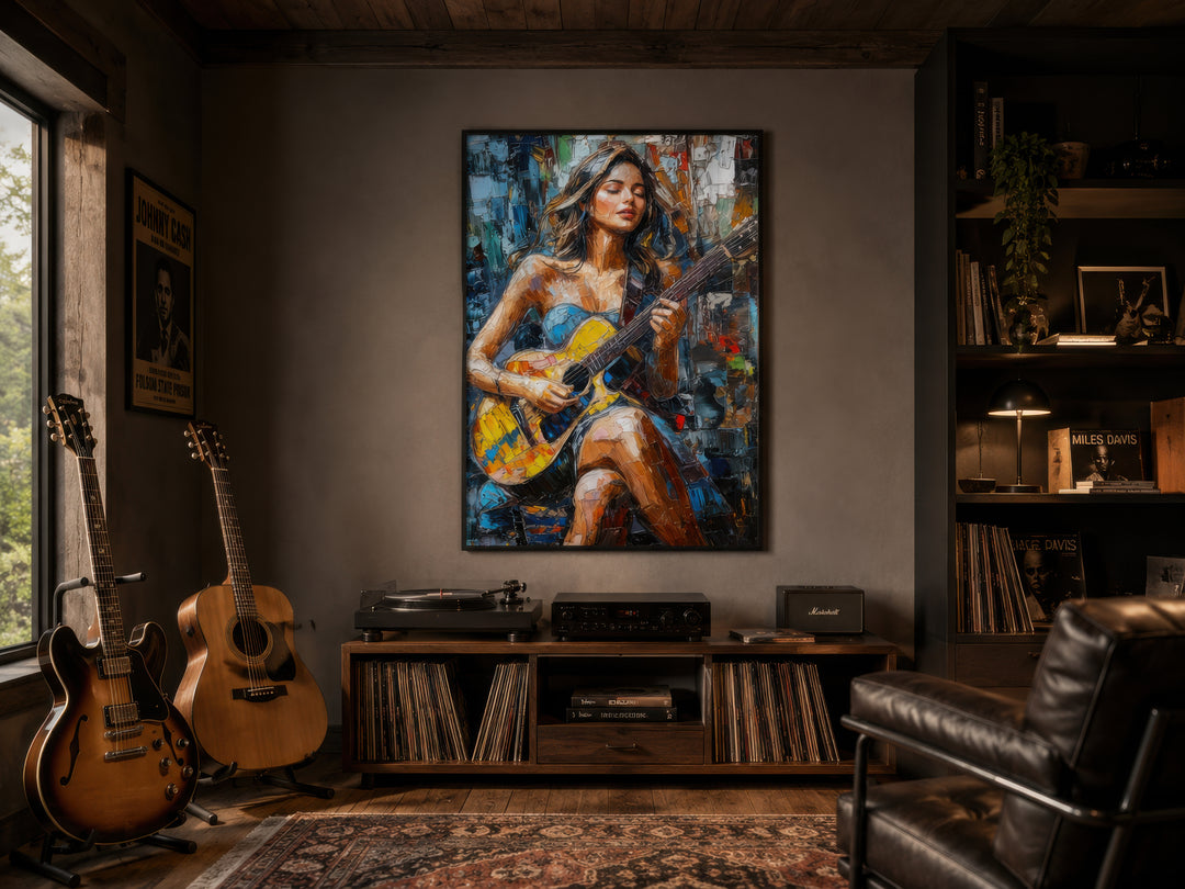 A large, colorful abstract canvas of a woman playing guitar hangs in a cozy, music-themed room.