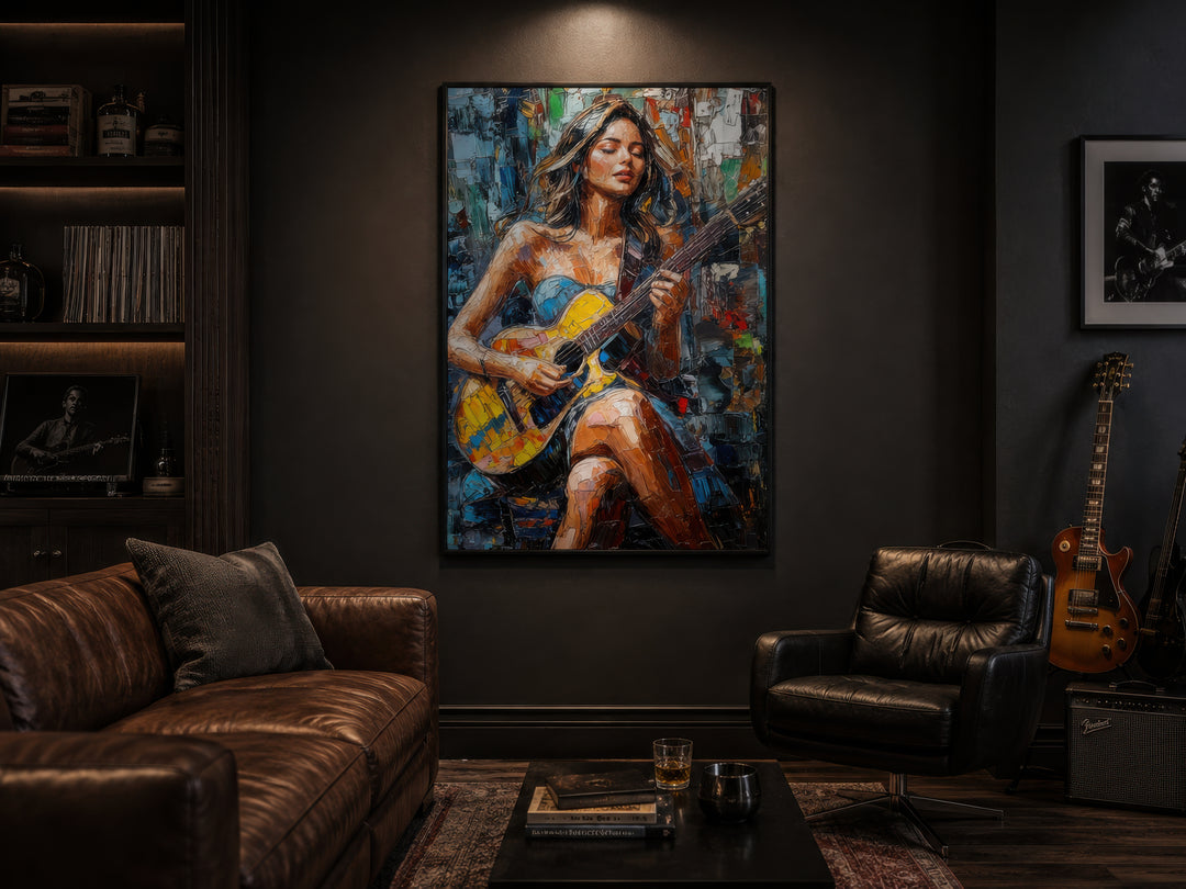 A large, colorful abstract painting of a woman playing guitar hangs in a dark, modern living room.