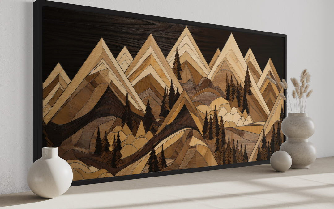 Framed canvas wall art featuring a geometric wood-effect mountain landscape in warm earthy tones.