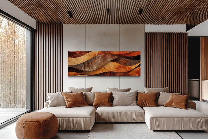 Horizontal framed canvas wall art with a rustic wood texture design above a modern sectional sofa.