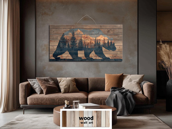 Wooden bear silhouette wall art featuring a mountain and forest scene on distressed wood planks.