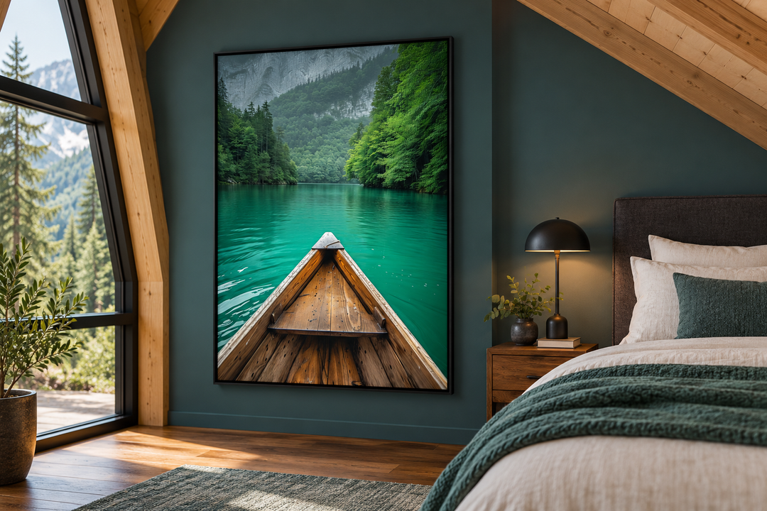 Vertical framed canvas wall art of a wooden canoe on an emerald green lake in a bedroom setting.