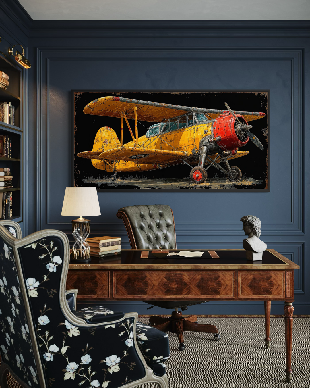Yellow vintage biplane framed canvas wall art displayed in a sophisticated dark blue home office.