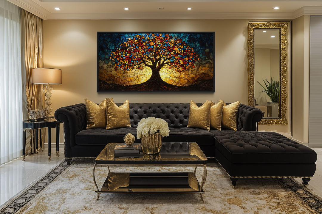 Yggdrasil framed canvas wall art in a stained glass style above a black sofa in a living room.