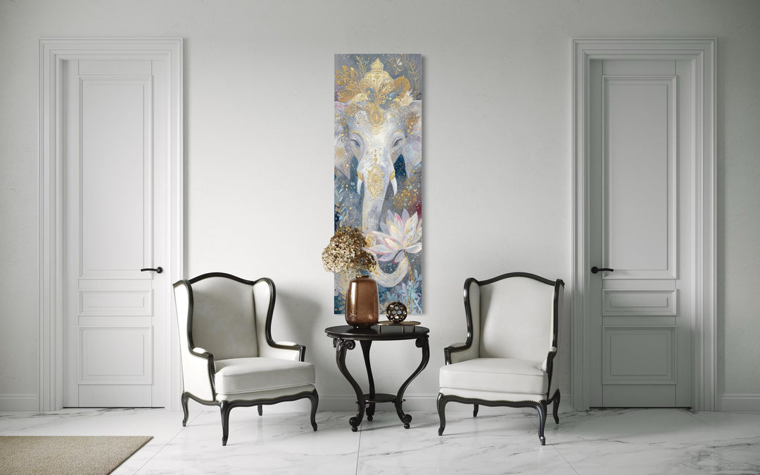 Vertical narrow canvas print of Zen Ganesha with a lotus flower in a white minimalist room.