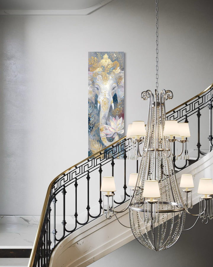 Vertical narrow canvas print of a Zen Ganesha with a lotus flower on a white wall by a staircase.