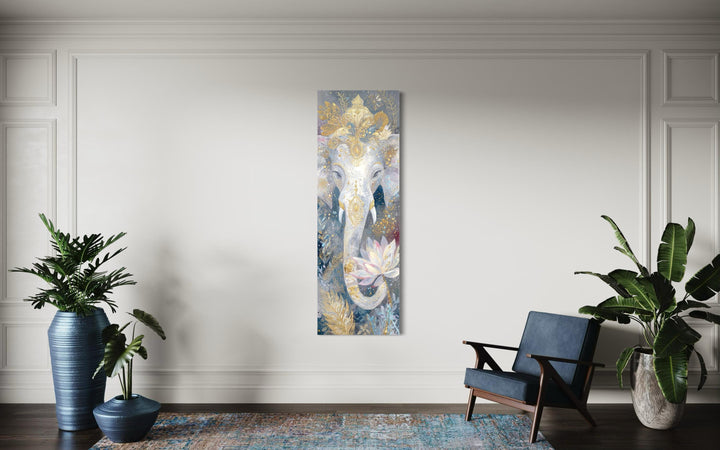 Vertical narrow canvas print of a Zen Ganesha with a lotus flower in a modern living room.