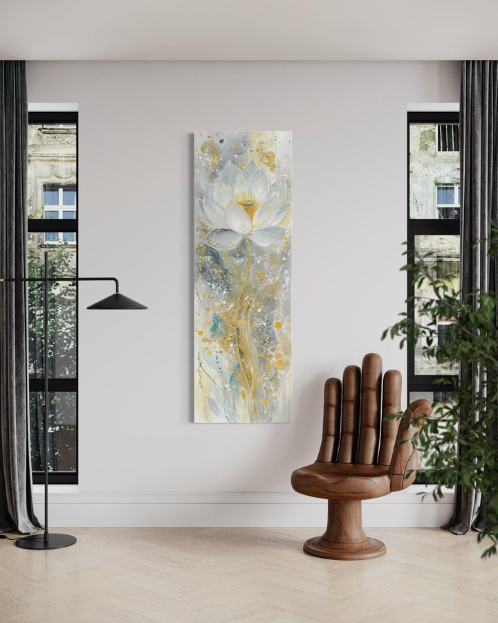 Vertical narrow canvas print of an abstract white and gold lotus flower in a modern room.