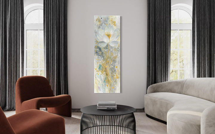 Vertical narrow canvas print featuring an abstract white and gold lotus flower in a modern room.
