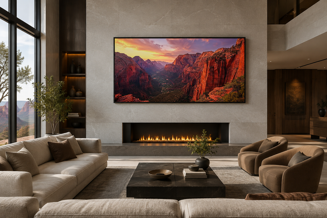 Framed canvas wall art of Zion National Park sunset over a fireplace in a modern living room.
