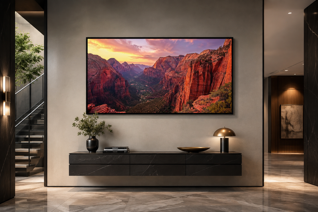 Framed canvas wall art of a Zion National Park sunset over a modern black floating console.