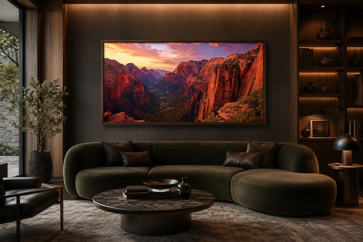 Zion National Park sunset framed canvas wall art above a dark green sofa in a modern living room.