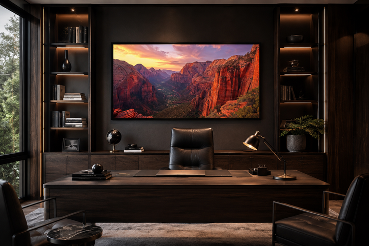 Zion National Park sunset framed canvas wall art hanging in a dark, modern office setting.