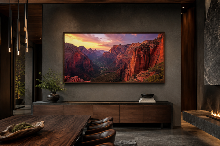 Framed canvas wall art of Zion National Park sunset over red rock canyons in a modern living room.