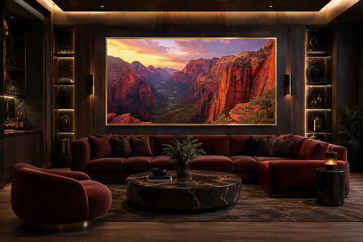 Zion National Park sunset photo style framed canvas wall art above a red sofa in a modern room.