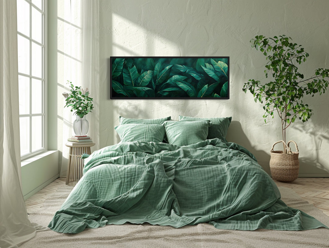 Green Tropical Leaves Long Narrow Horizontal Framed Canvas Wall Art above green bed