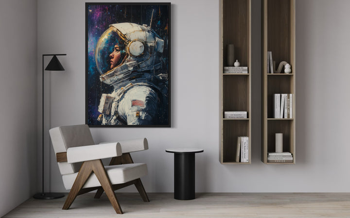 Female Astronaut Graffiti Framed Canvas Wall Art in the library