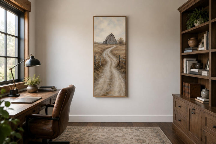 Tall narrow farmhouse wall art of a weathered barn on a winding country road through golden fields.