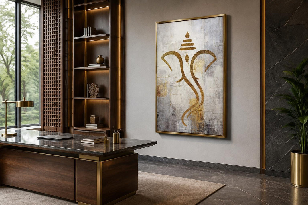 Minimalist gold Lord Ganesha outline on a textured white and silver canvas in a gold frame.