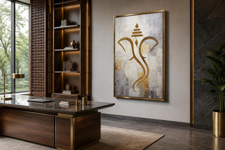 Minimalist gold Lord Ganesha outline on a textured white and silver canvas in a gold frame.
