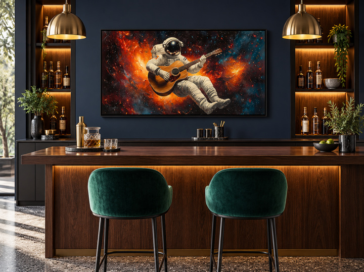 Astronaut playing guitar framed canvas wall art displayed above a modern home bar.