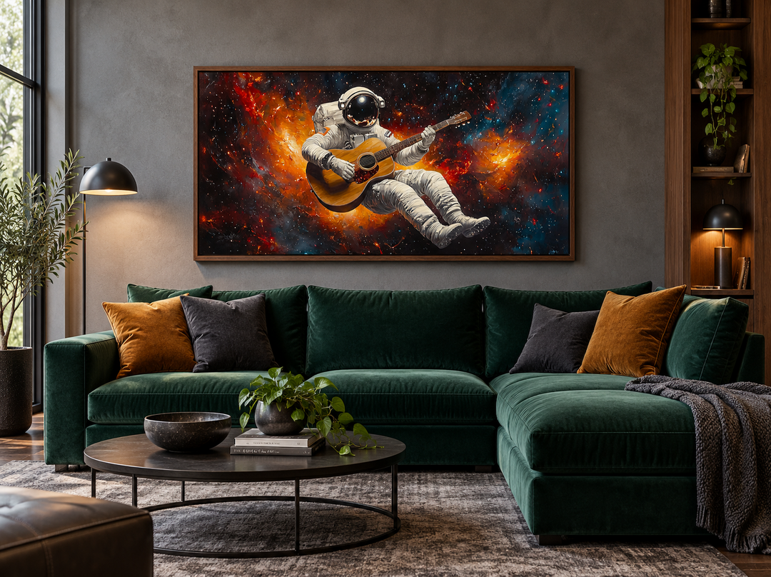 Astronaut playing guitar framed canvas wall art above a green sectional sofa in a modern room.