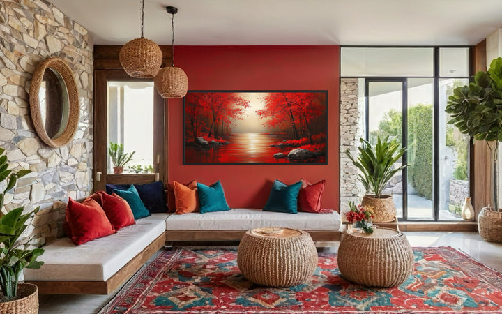 Red Trees And River Autumn Landscape Framed Canvas Wall Art in a living room with red walls