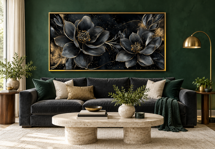 Black gold floral Art Nouveau framed canvas wall art above a dark sofa in a green living room.