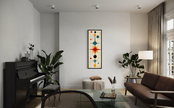 Vertical narrow mid-century modern wall art featuring an abstract atomic starburst print.
