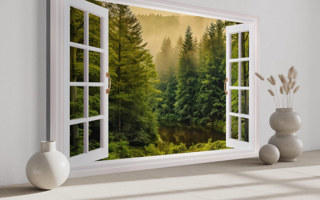 Fake window wall art showing a foggy pine tree forest and river through an open white frame.