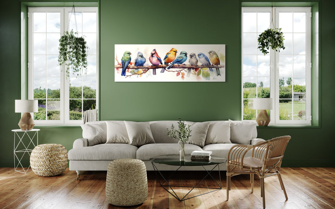 Colorful Birds On A Branch Horizontal Framed Canvas Wall Art in a living room filled with furniture