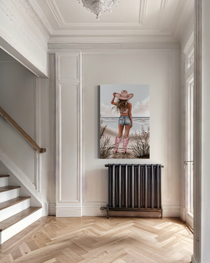 Coastal Cowgirl In Pink Boots And Hat On The Beach Framed Canvas Wall Art in hallway