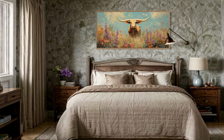 Longhorn in Wildflower Field Rustic Farmhouse Canvas Wall Art above rustic bed