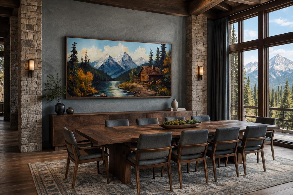 Mountain cabin on the river nature vintage style canvas wall art in a rustic dining room.