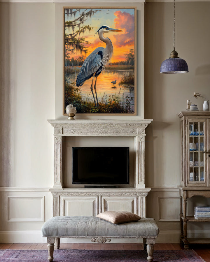 Blue Heron at Sunset Marshland Framed Canvas Wall Art above fireplace